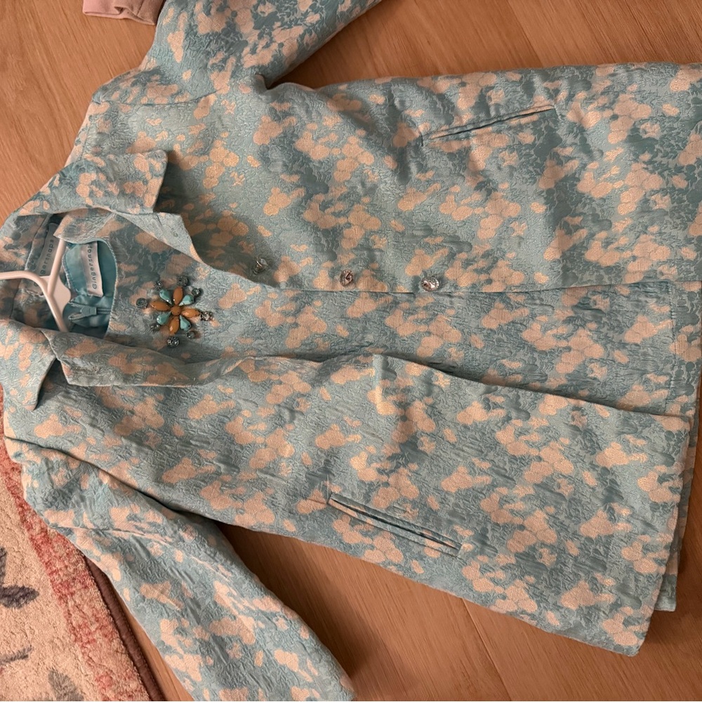 Elegant Blue and Cream Brooch-Embellished Dress